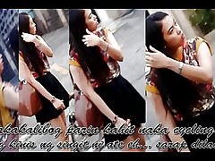 בחורה בוסו צהוב לבן על אופניים